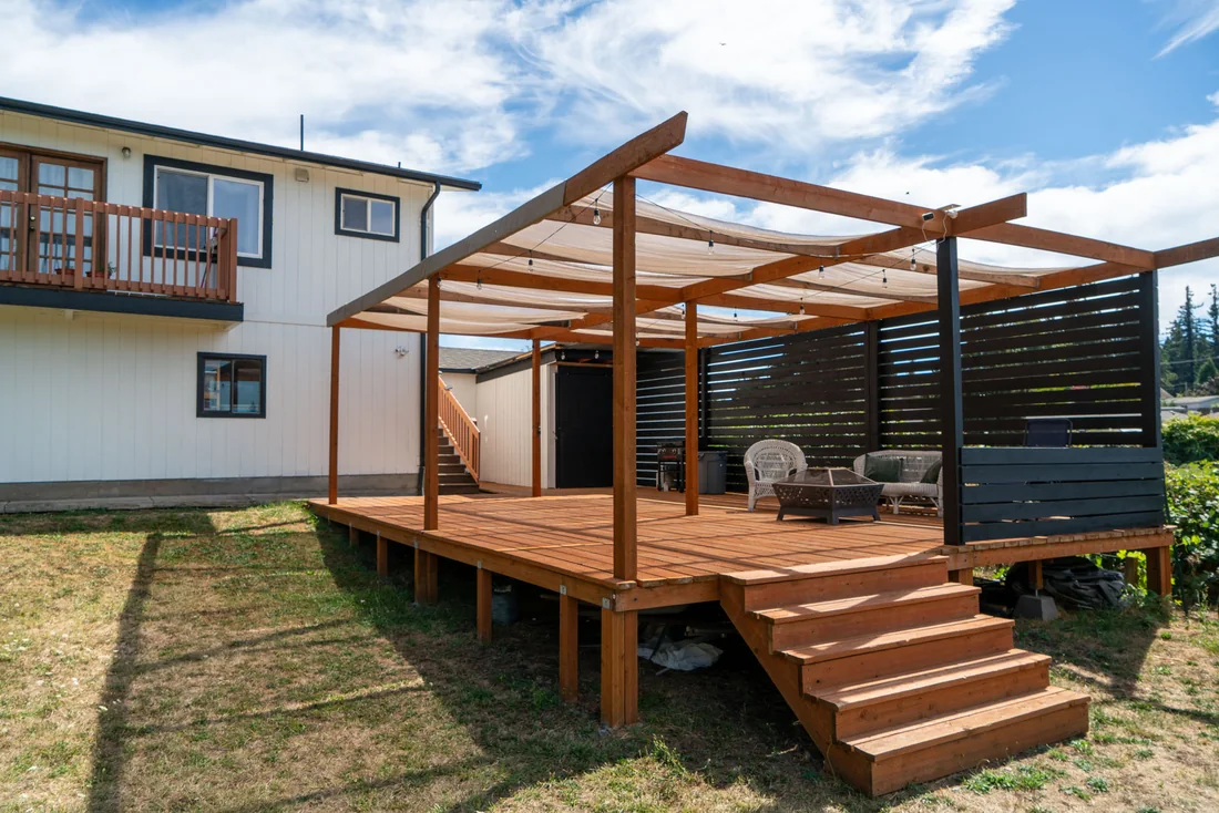 Cedar deck and pergola built off the back of the house